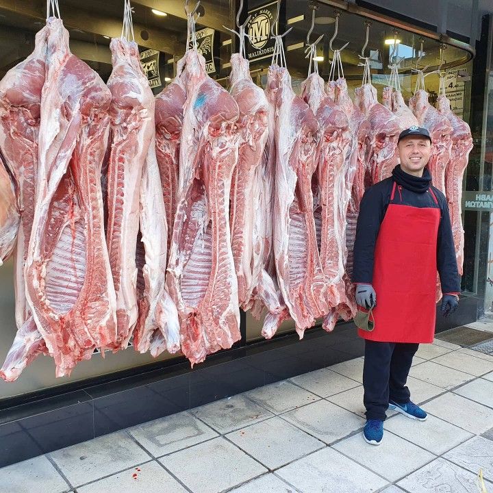 Master butcher hand-selecting premium cut at The Prime Butchery